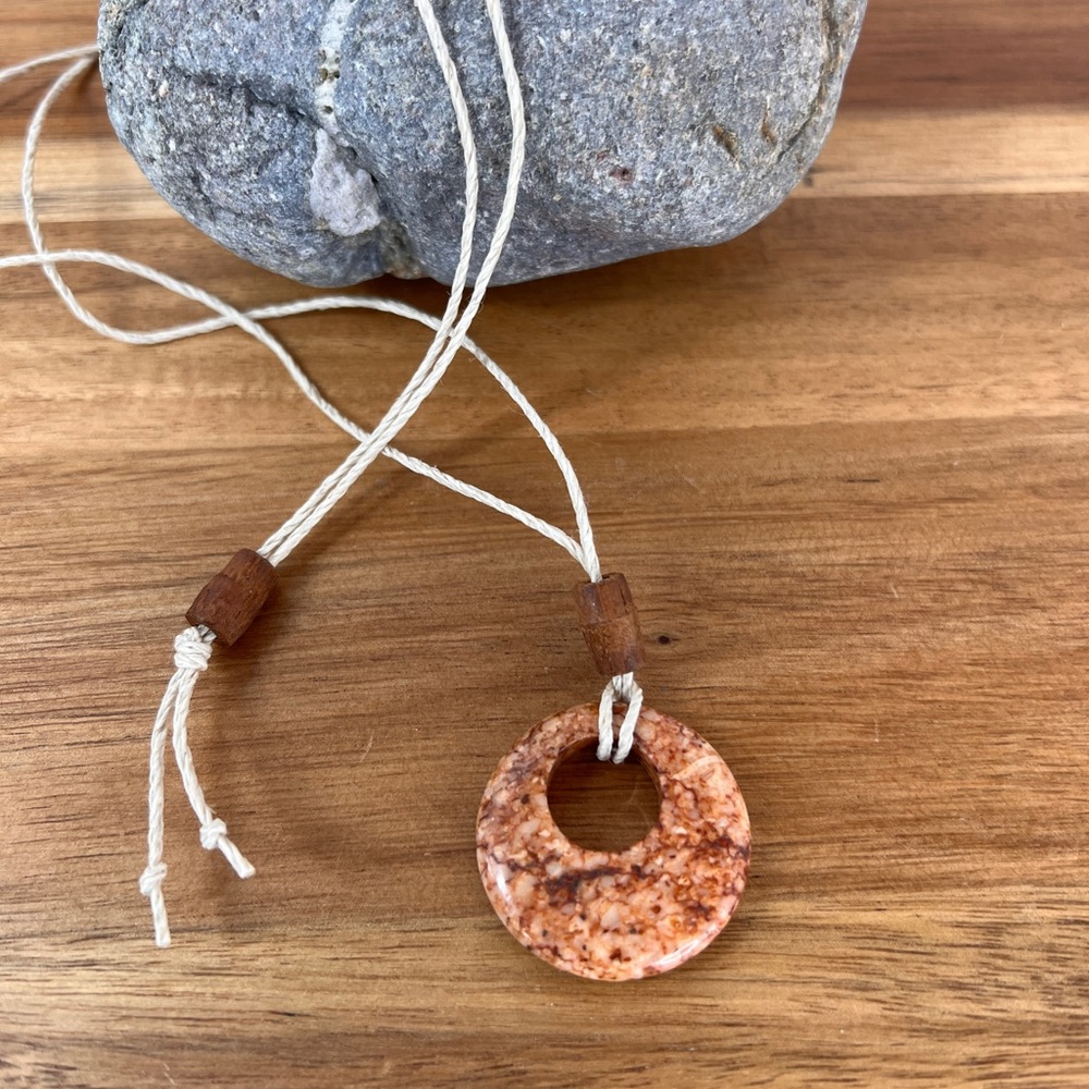 Natural stone pendant on hemp